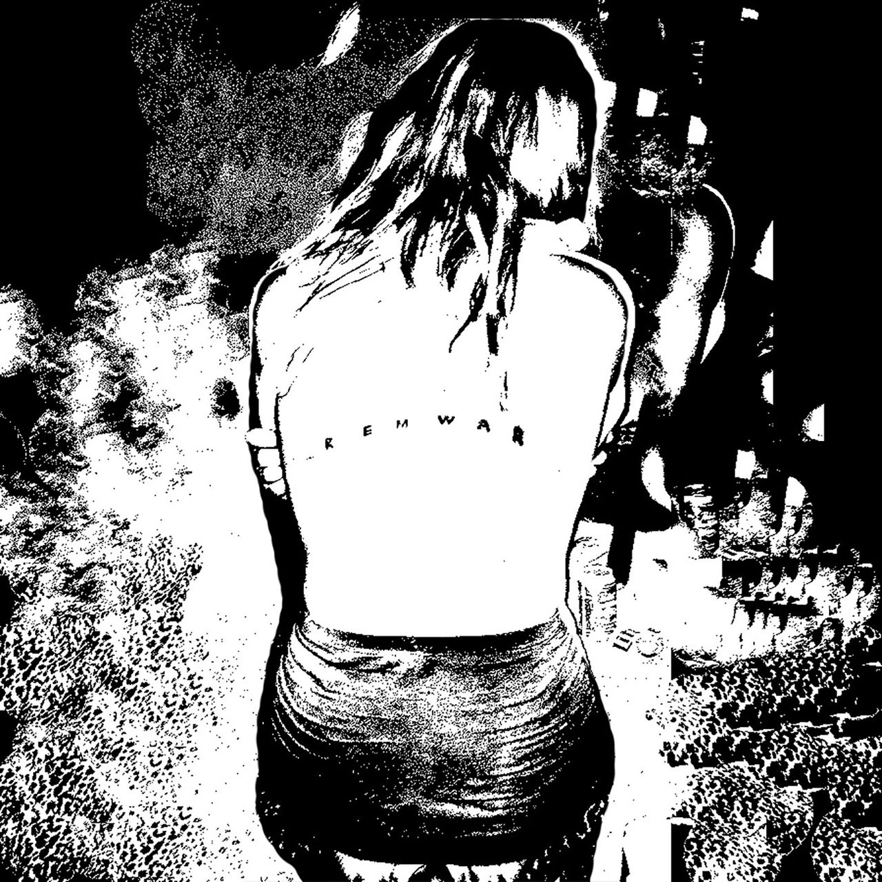 a person showing a tattoo across their back that says REMWAR
